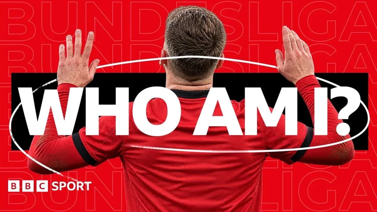 Player in red jersey with hands raised in question Player in red jersey with hands raised in question