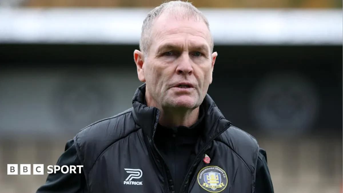 Manager wearing club jacket at training ground Manager wearing club jacket at training ground