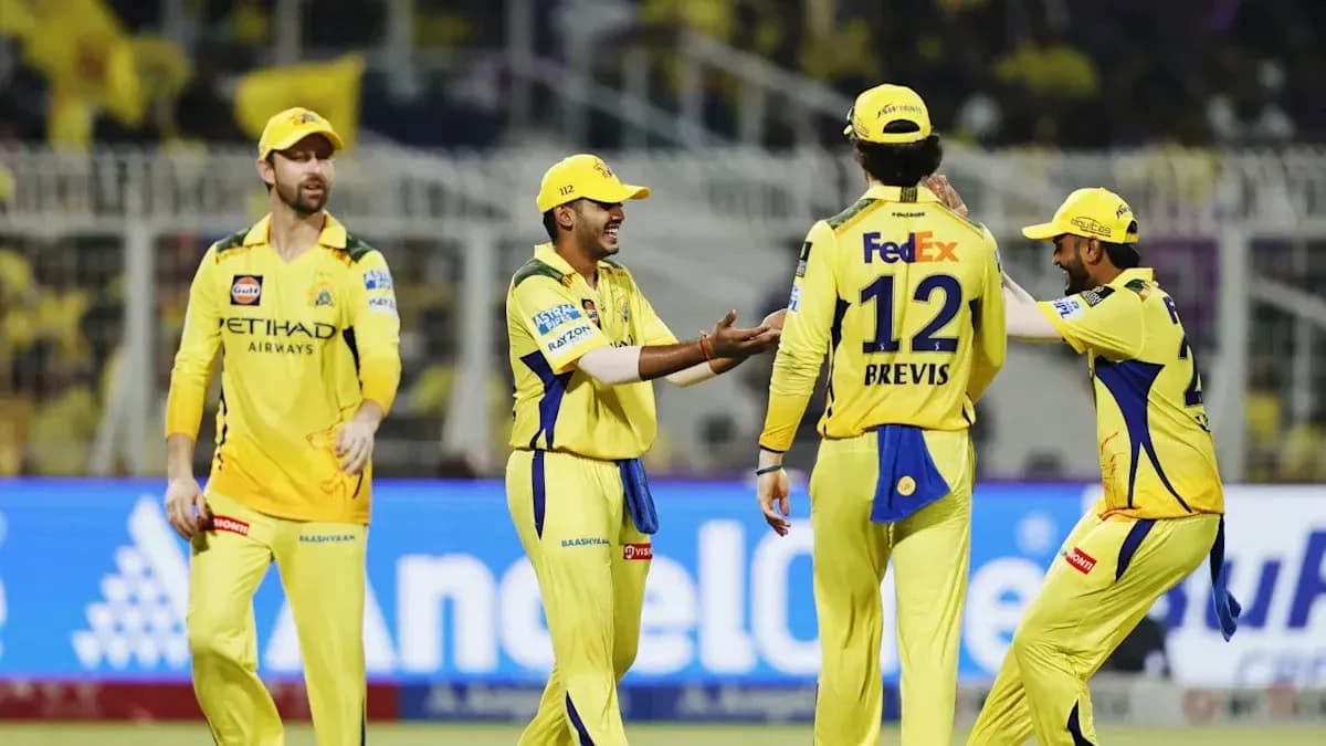 Chennai Super Kings players celebrating on the field Chennai Super Kings players celebrating on the field