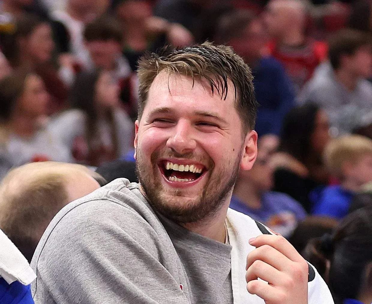 Player laughing on the bench during game Player laughing on the bench during game