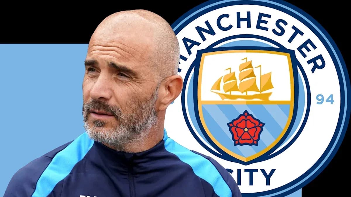 Coach next to Manchester City logo background Coach next to Manchester City logo background