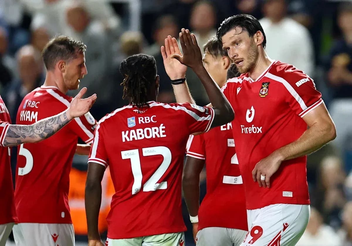 Players celebrating after a goal during match Players celebrating after a goal during match
