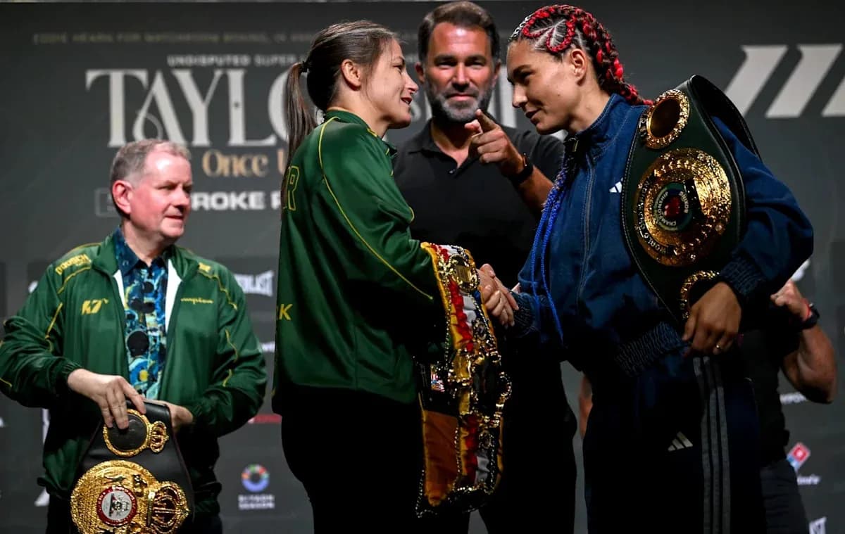 Boxers shaking hands at press conference with belts Boxers shaking hands at press conference with belts