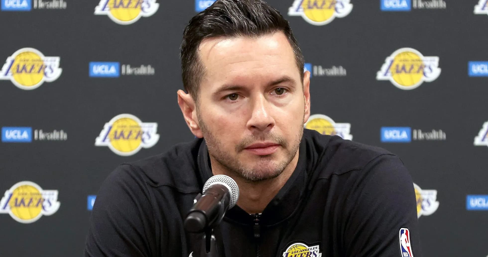 Coach speaking at Los Angeles Lakers press conference Coach speaking at Los Angeles Lakers press conference
