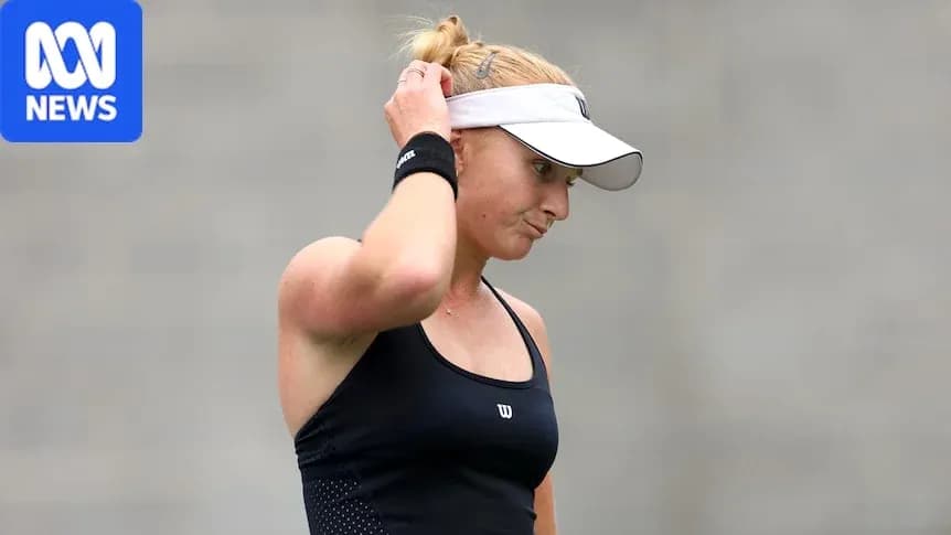 Tennis player adjusting cap during match Tennis player adjusting cap during match