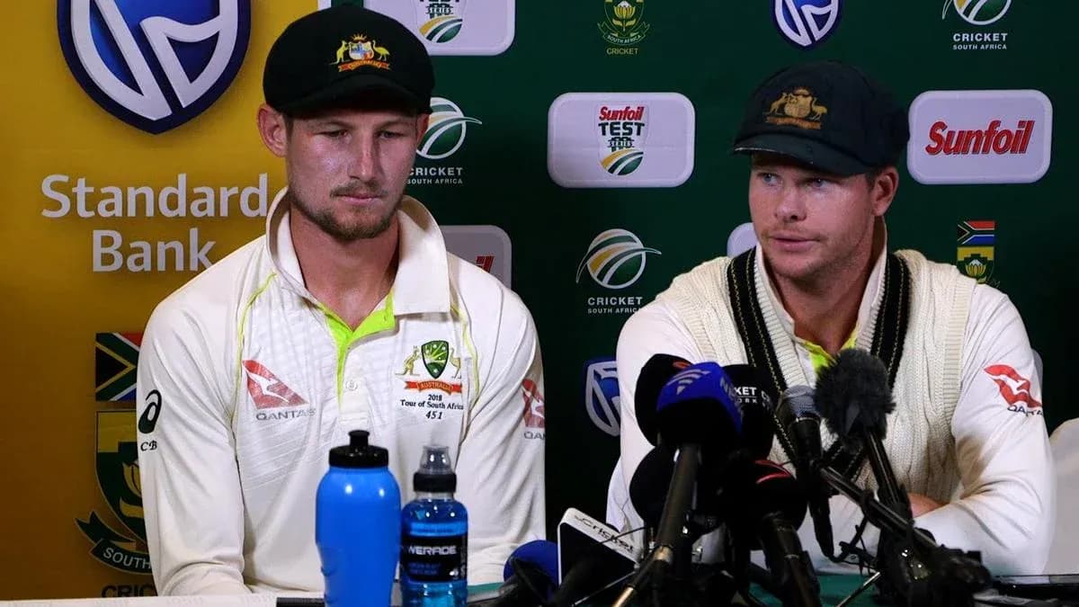 Two Australian cricketers at press conference table Two Australian cricketers at press conference table