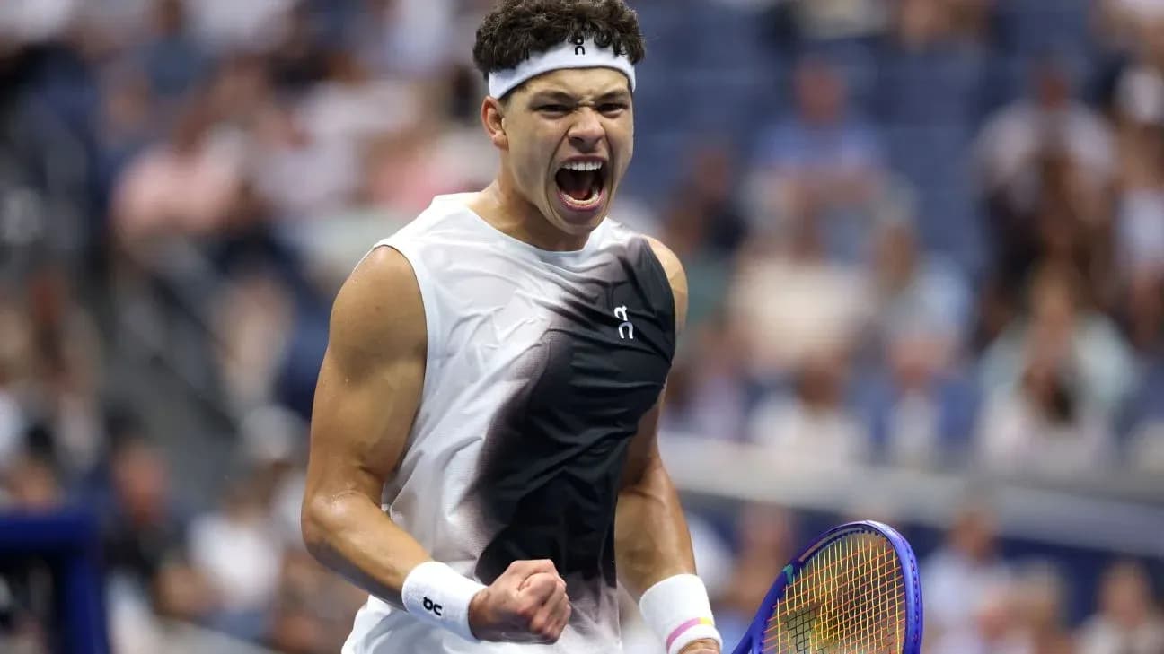 Tennis player celebrating during a match Tennis player celebrating during a match