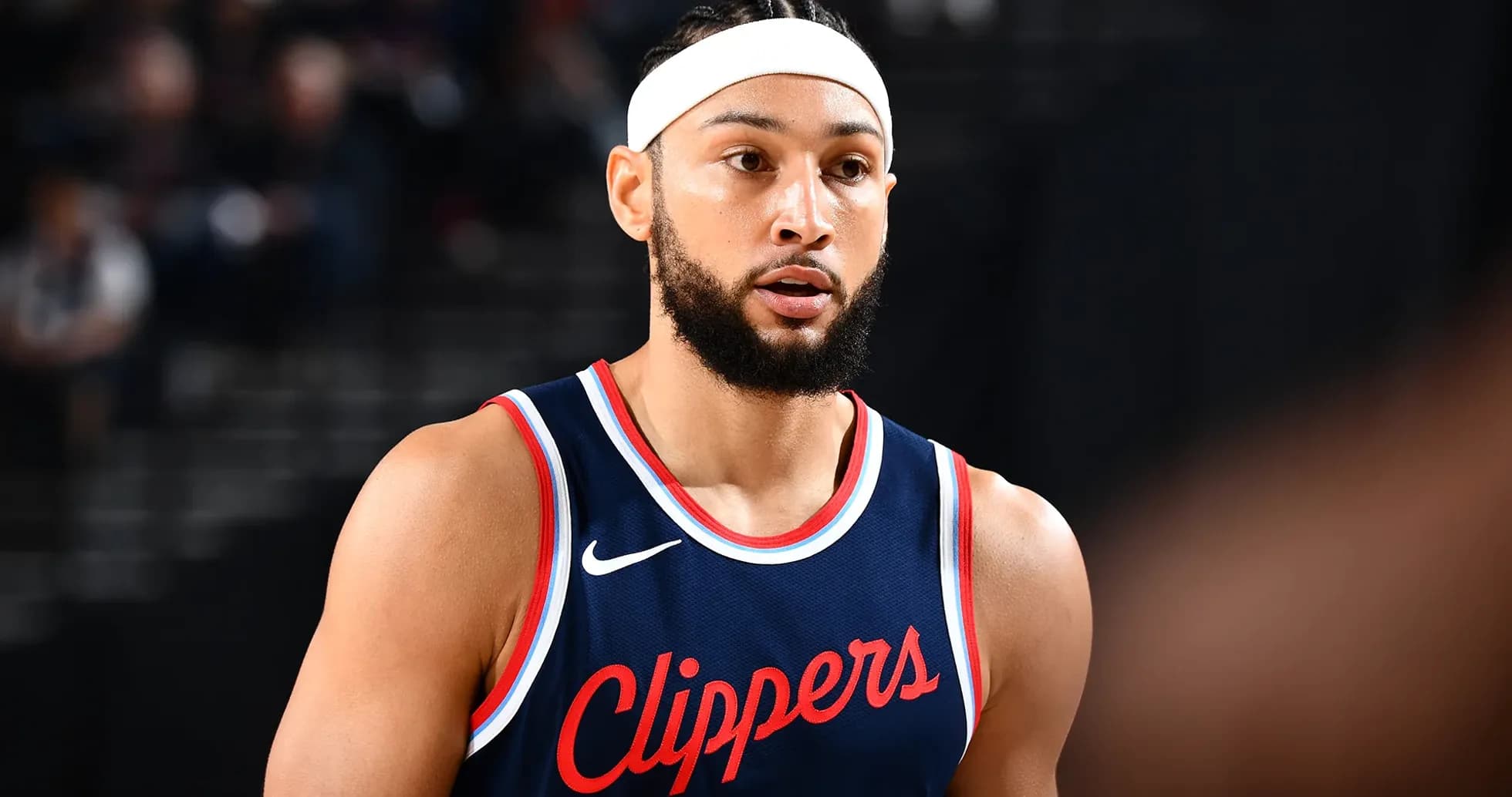Basketball player in Clippers jersey during game Basketball player in Clippers jersey during game