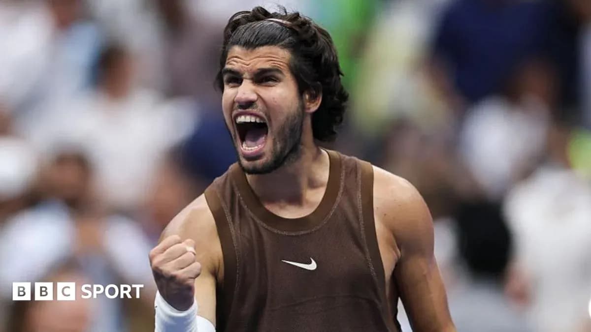 Tennis player celebrating with raised fist during match Tennis player celebrating with raised fist during match