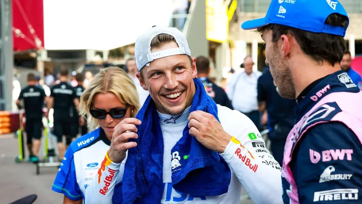 Two drivers chatting with a towel after race Two drivers chatting with a towel after race