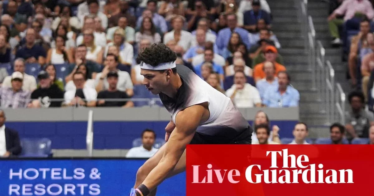Player serving during a tennis match with audience Player serving during a tennis match with audience