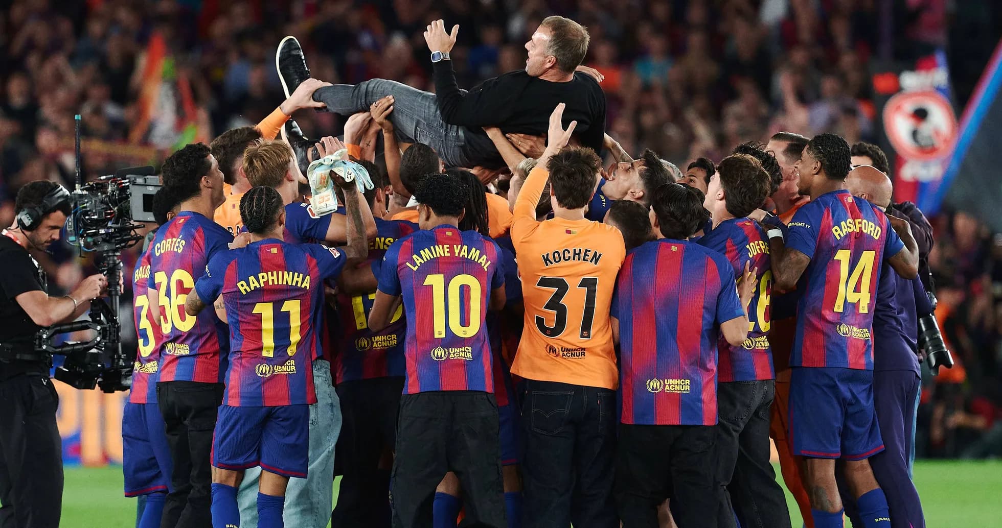 Barcelona players celebrating and lifting their coach Barcelona players celebrating and lifting their coach
