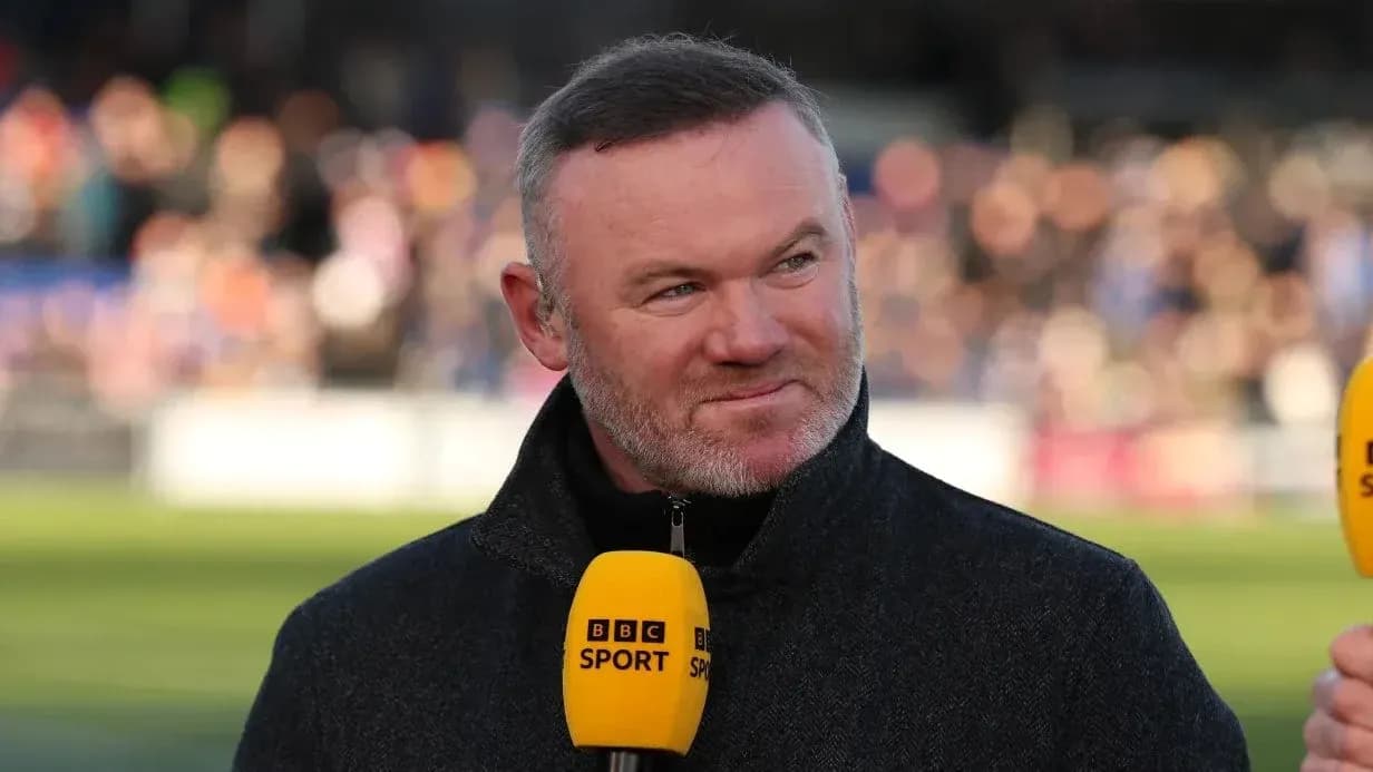 Presenter speaking with microphone at sports event Presenter speaking with microphone at sports event