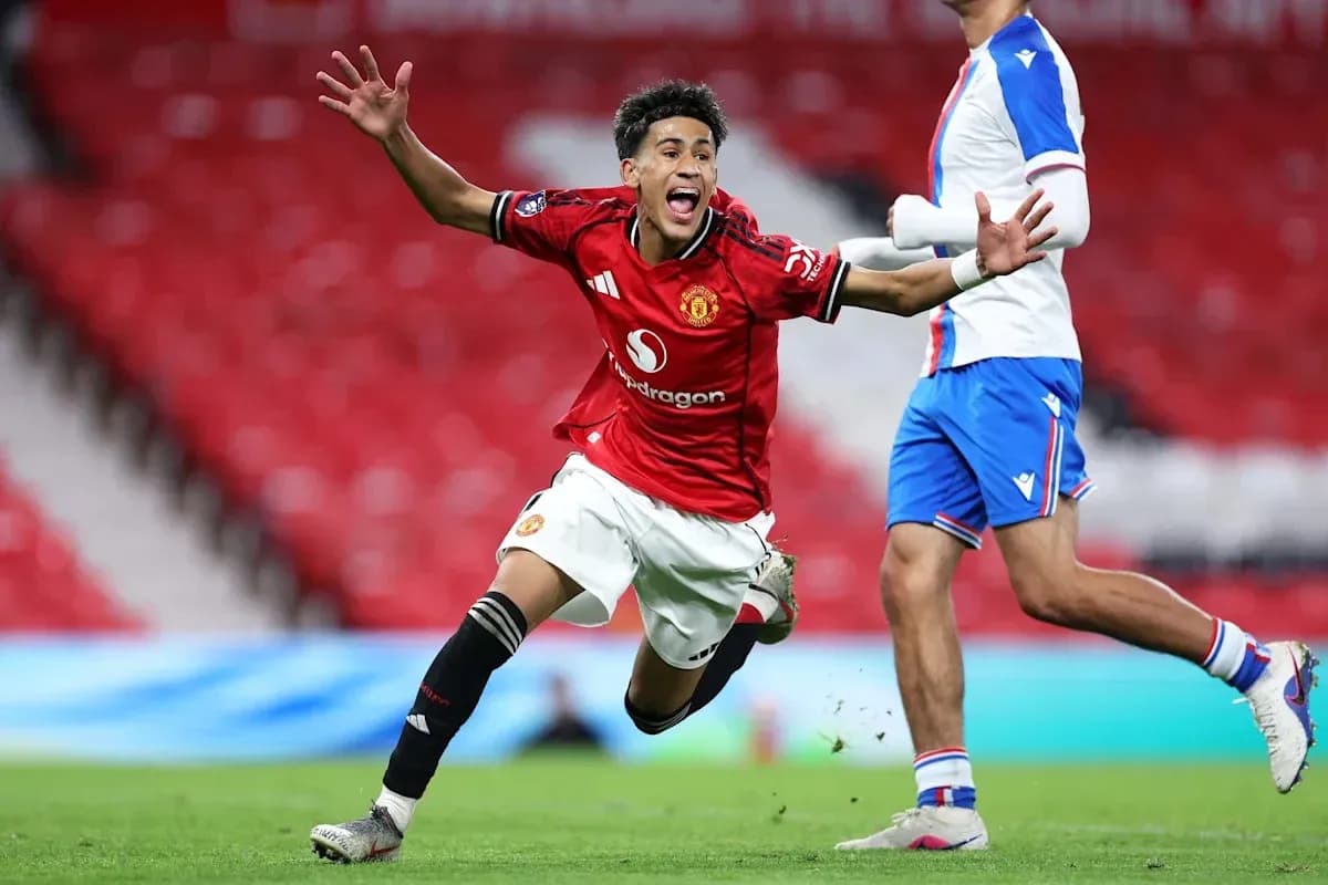 Player celebrating goal in Manchester United kit Player celebrating goal in Manchester United kit