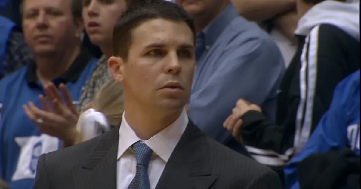Coach observing the game from the sideline Coach observing the game from the sideline