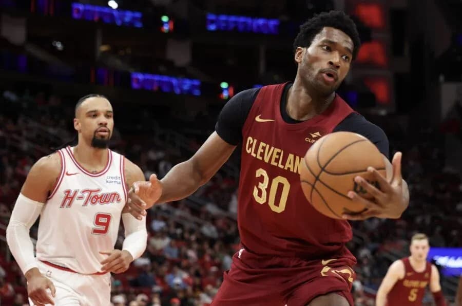 Cleveland player dribbling basketball during game Cleveland player dribbling basketball during game