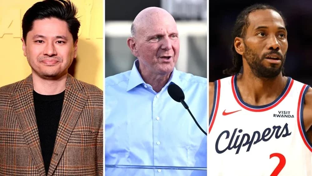 Three individuals, including a basketball player, at an event Three individuals, including a basketball player, at an event