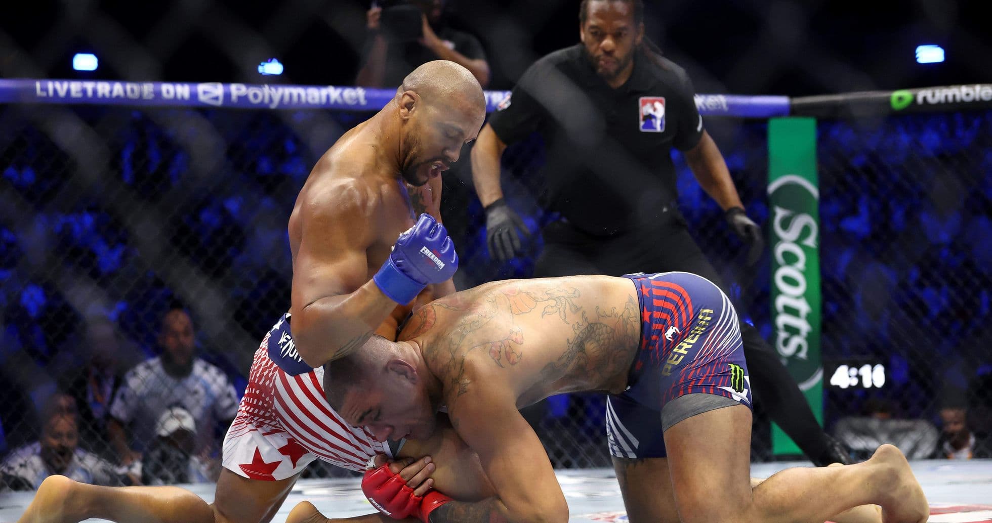 Fighter delivering a punch during MMA match Fighter delivering a punch during MMA match