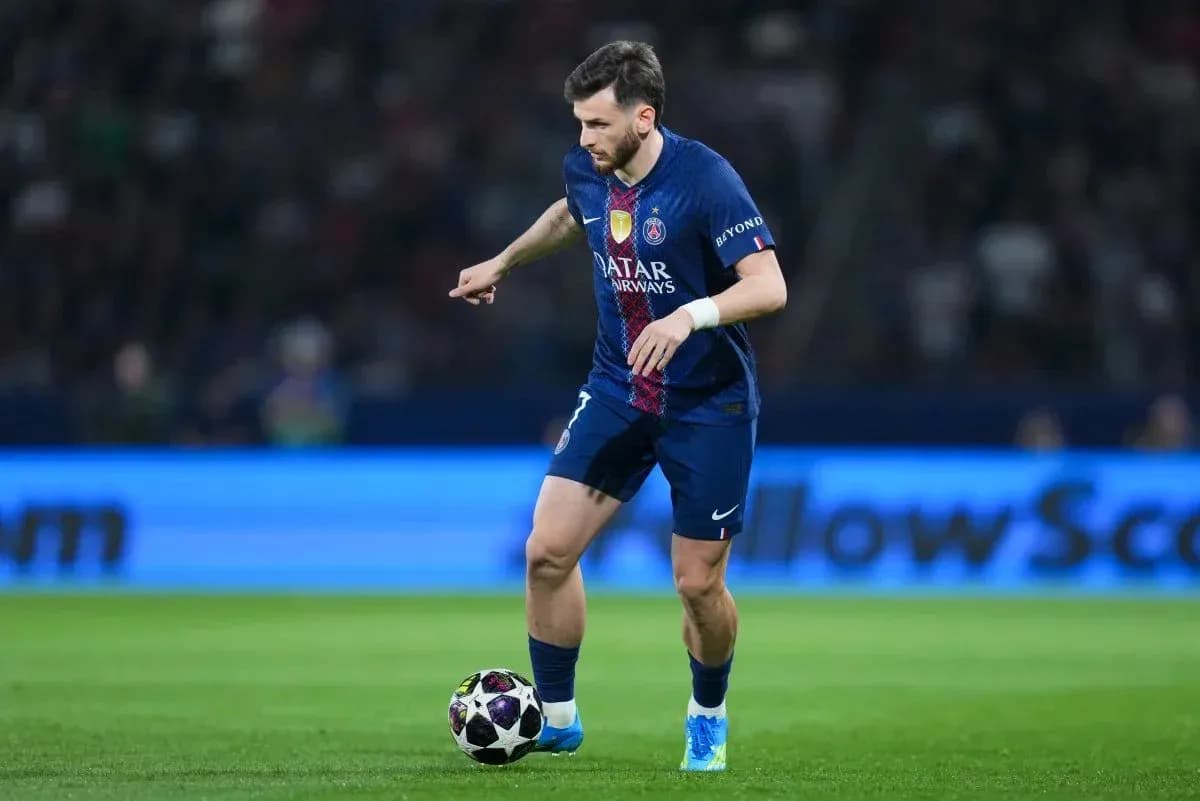 Player dribbling the ball during a match Player dribbling the ball during a match