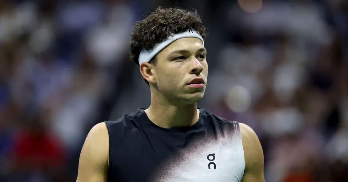 Tennis player wearing headband during match Tennis player wearing headband during match