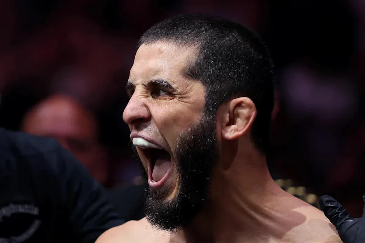Fighter shouting with mouthguard before match Fighter shouting with mouthguard before match