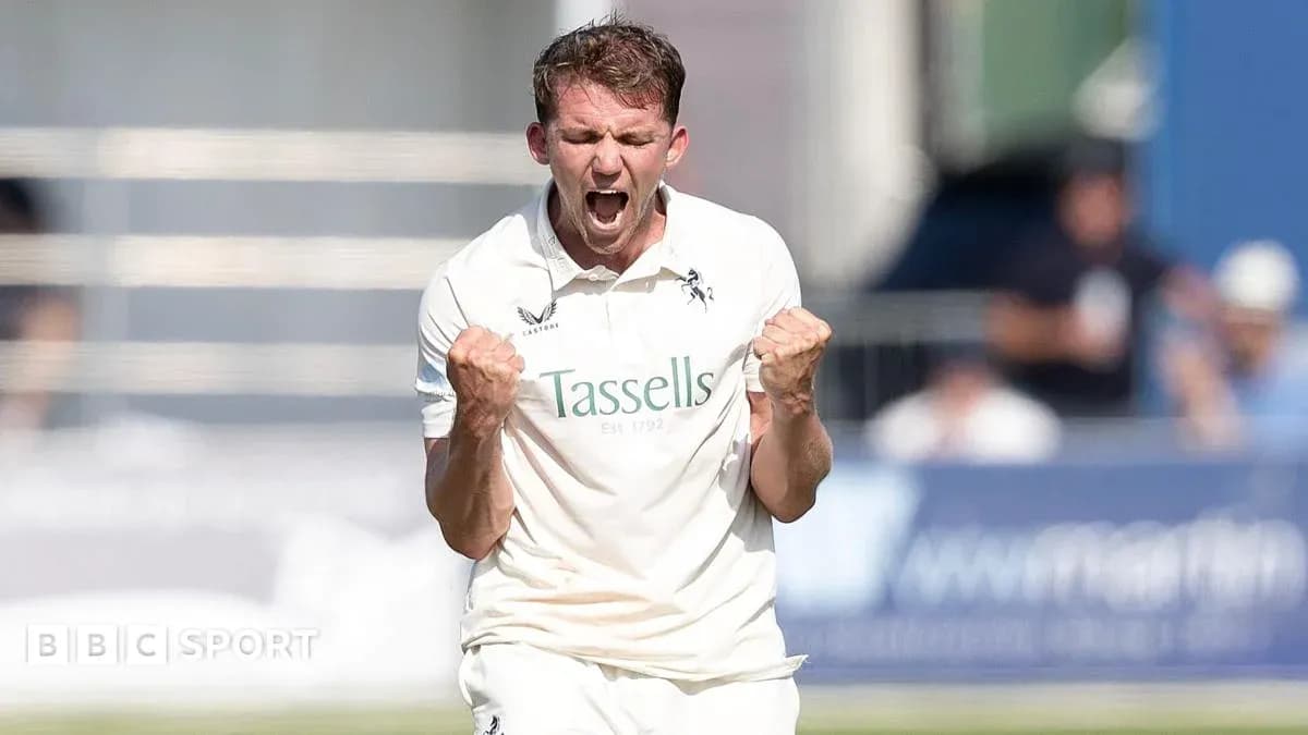 Cricketer celebrating a wicket with clenched fists Cricketer celebrating a wicket with clenched fists