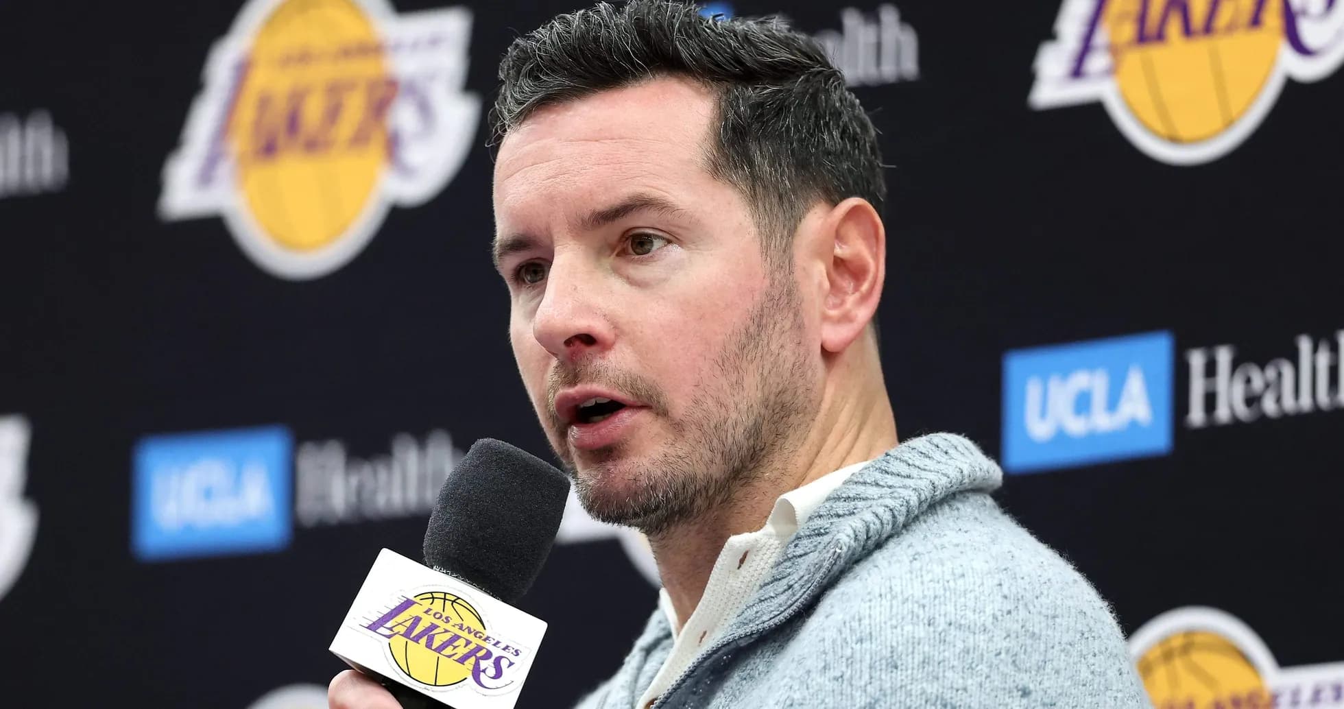 Person speaking at Los Angeles Lakers press conference Person speaking at Los Angeles Lakers press conference