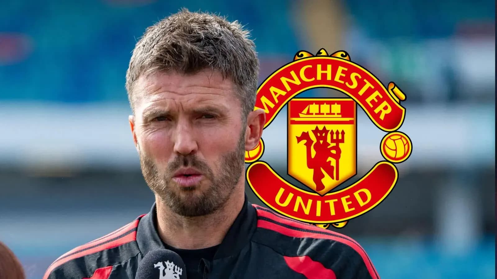 Coach speaking at press conference with Manchester United logo Coach speaking at press conference with Manchester United logo