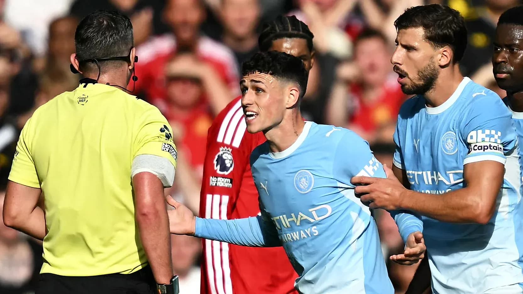 Players arguing with referee during match incident Players arguing with referee during match incident