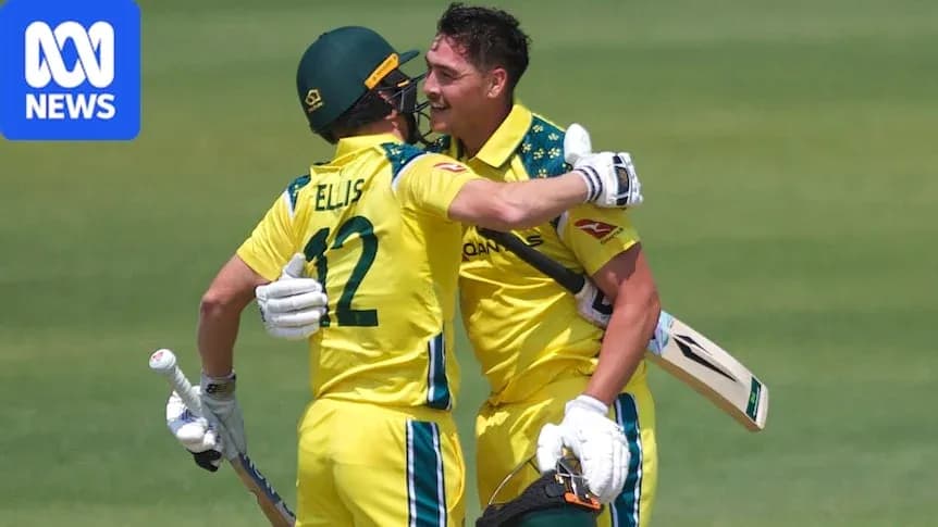 Two Australian cricketers celebrating a run together Two Australian cricketers celebrating a run together