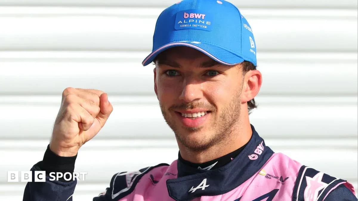 Driver celebrating with fist after race Driver celebrating with fist after race
