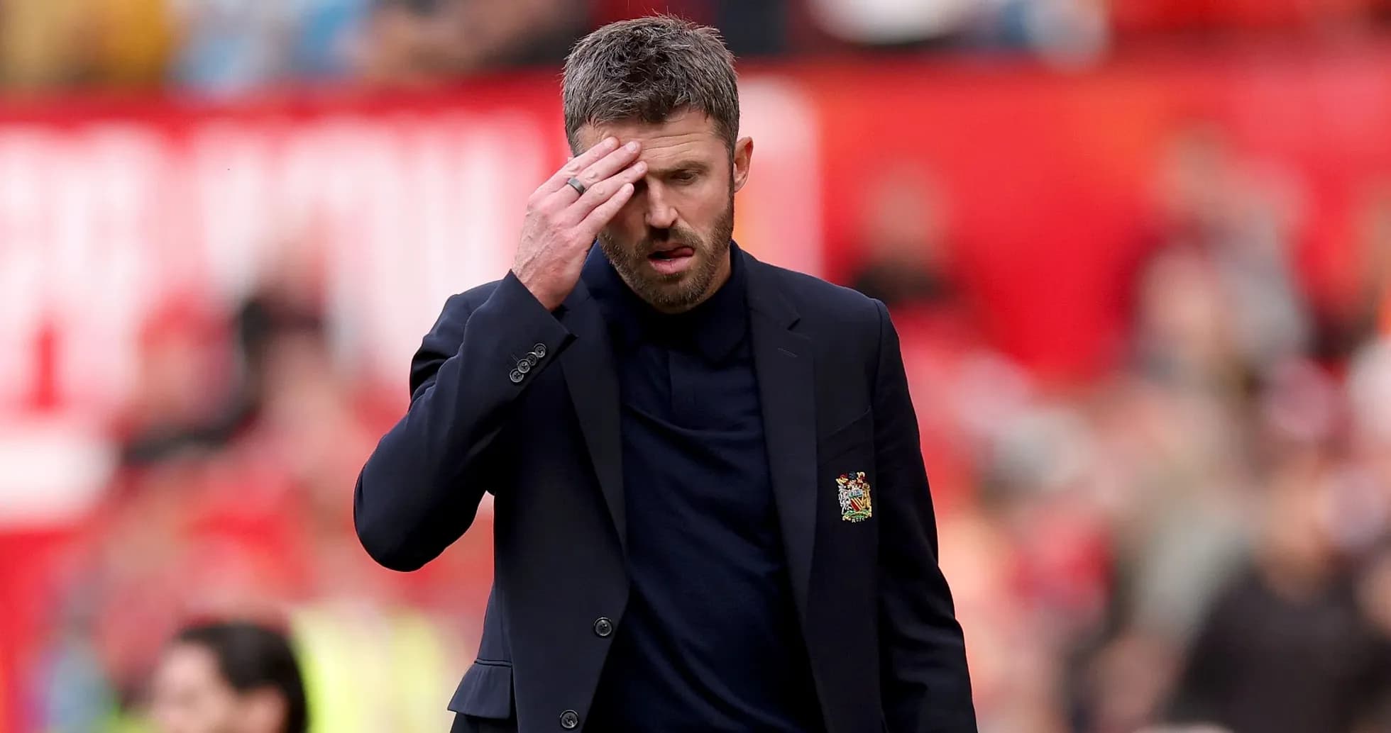 Manager walking with hand on forehead during match Manager walking with hand on forehead during match