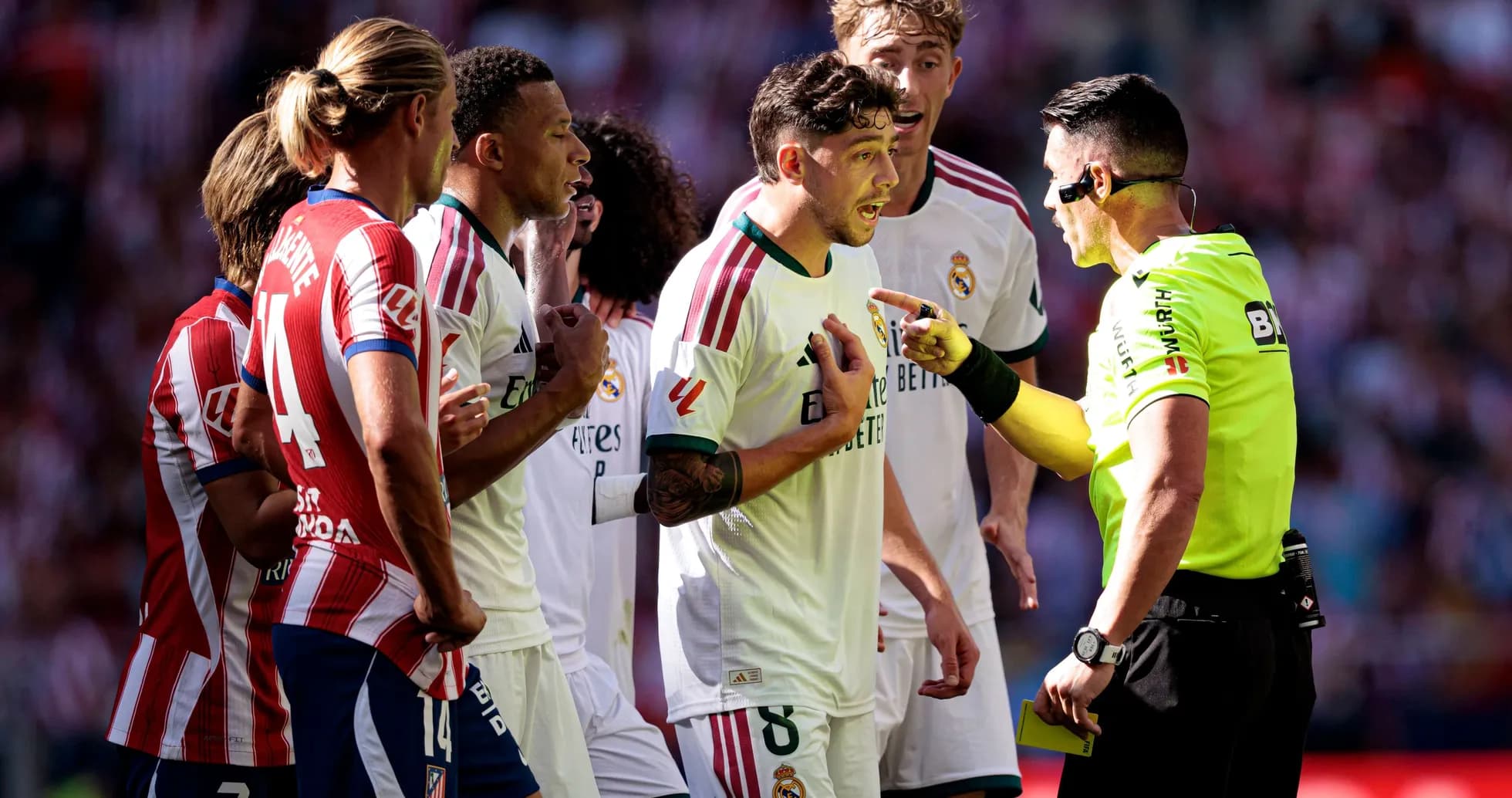 Players arguing with referee during match decision Players arguing with referee during match decision