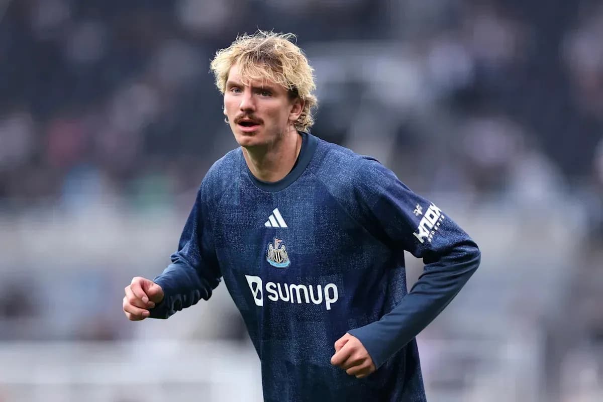 Player warming up in Newcastle training gear Player warming up in Newcastle training gear