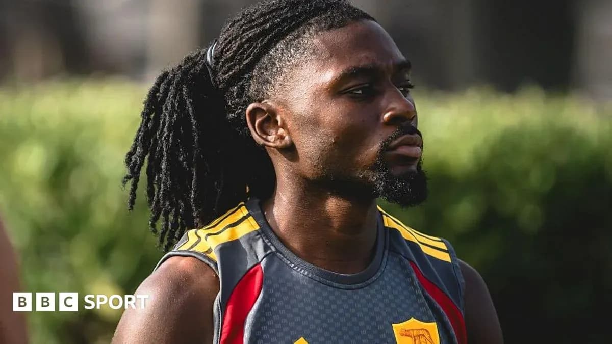 Player with long hair during training session Player with long hair during training session