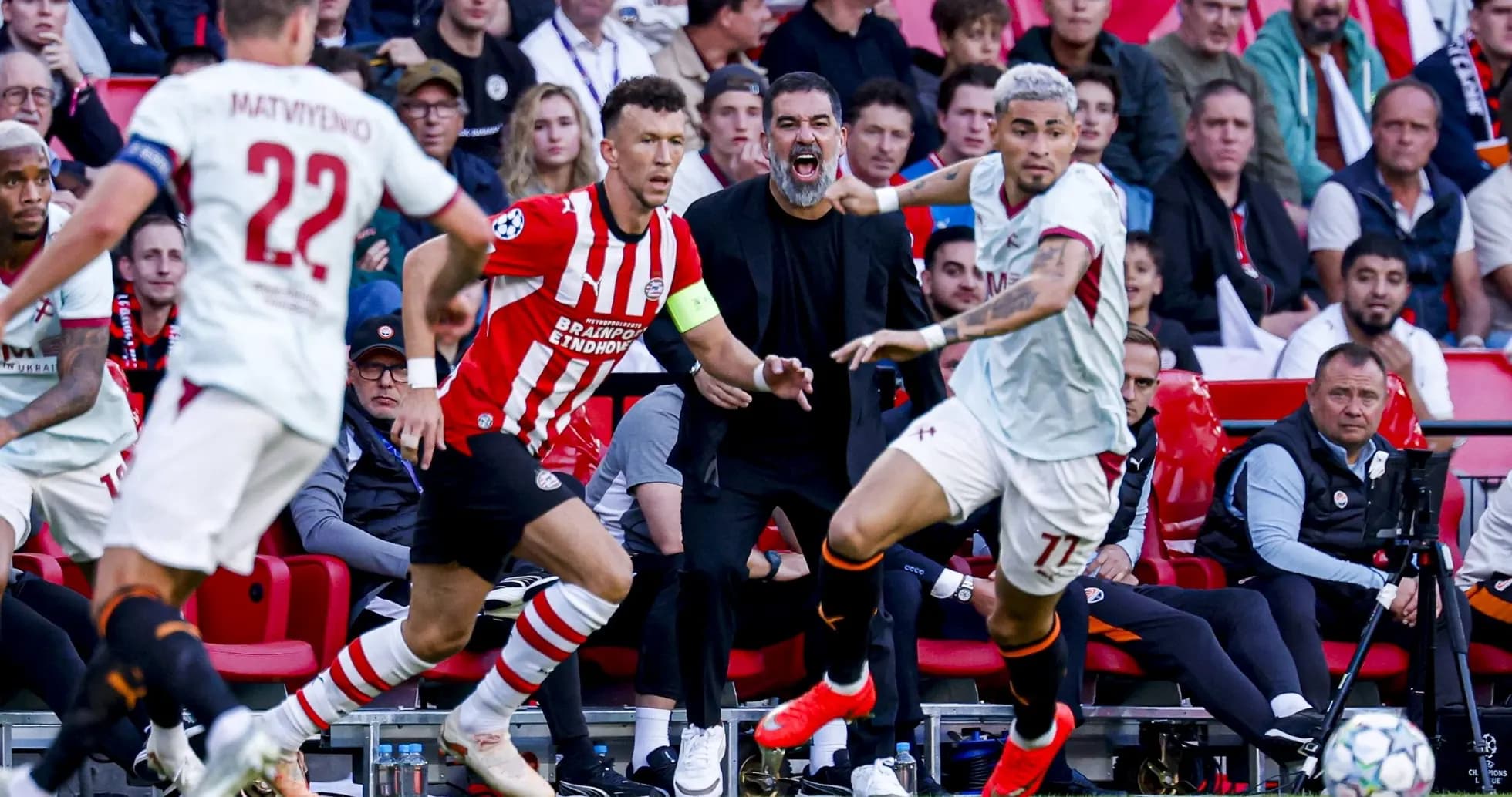 Players competing for the ball during a match Players competing for the ball during a match