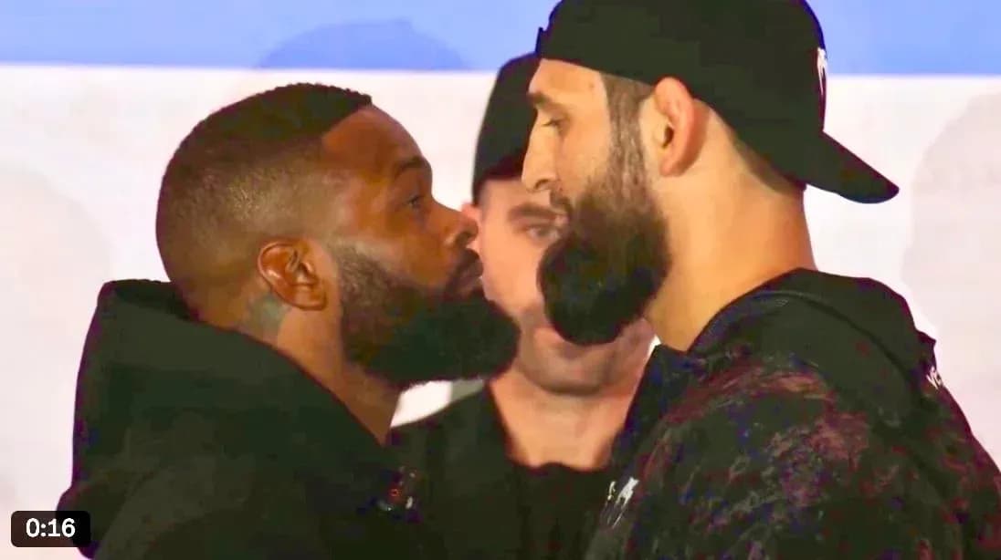 Two fighters facing off at weigh-in event Two fighters facing off at weigh-in event