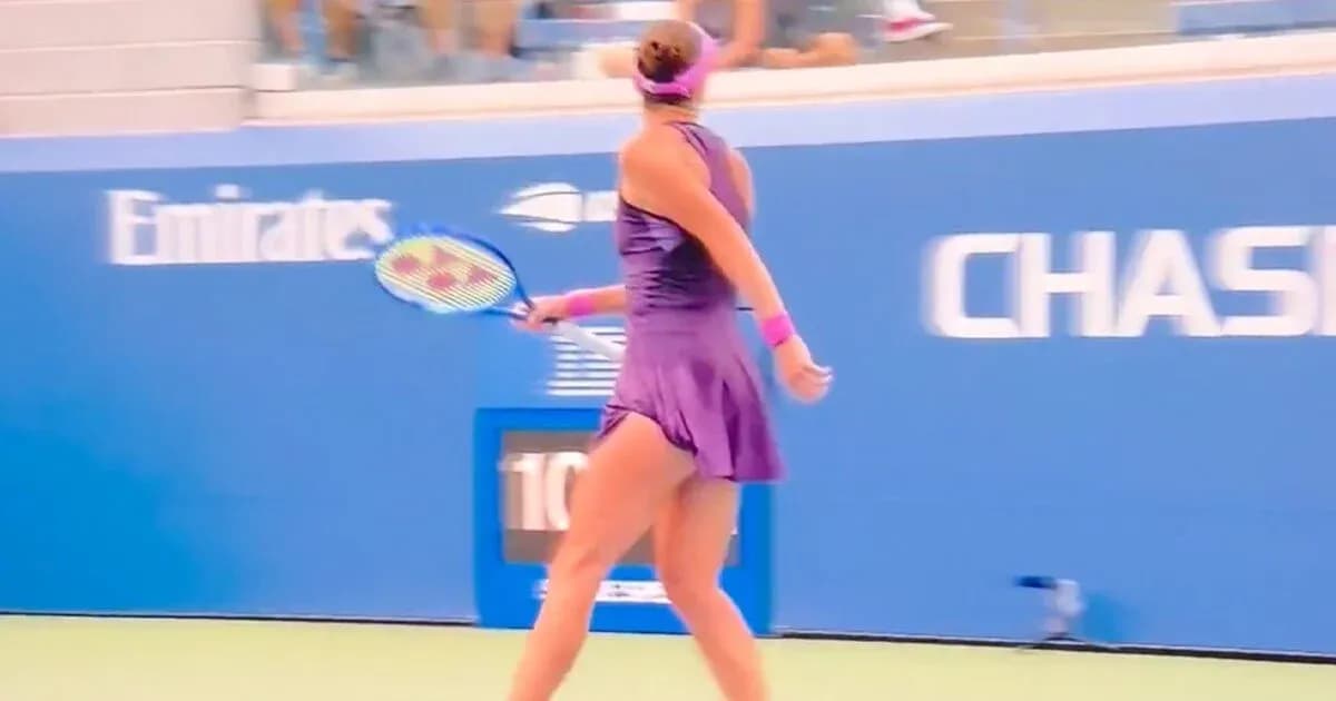 Female tennis player preparing to hit a shot Female tennis player preparing to hit a shot