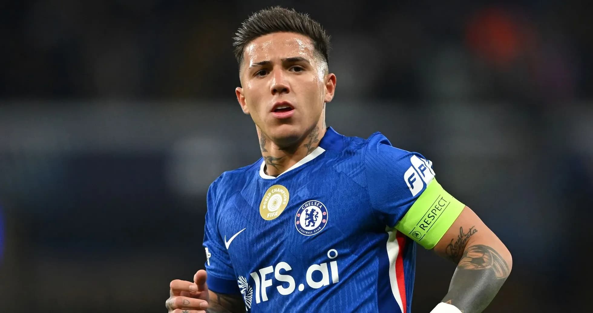 Player in blue Chelsea kit with captain's armband Player in blue Chelsea kit with captain's armband
