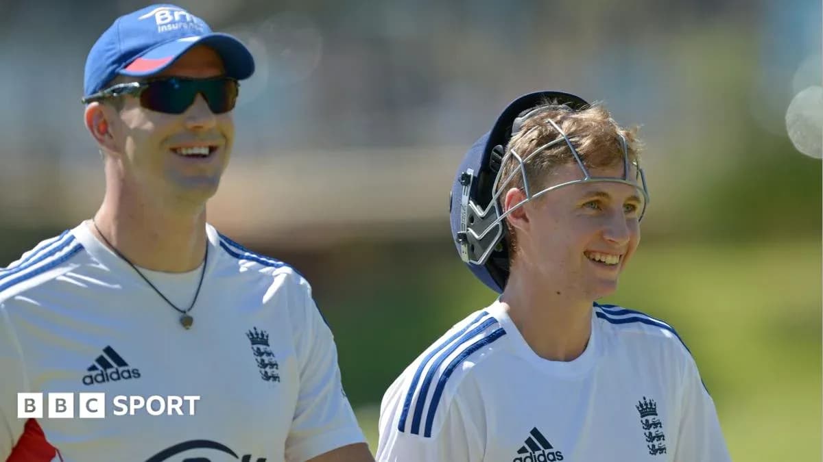 Two cricket players smiling during practice session Two cricket players smiling during practice session