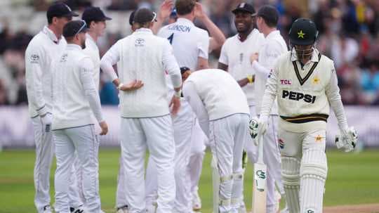 Pakistan batsman dismissed, England players celebrating Pakistan batsman dismissed, England players celebrating