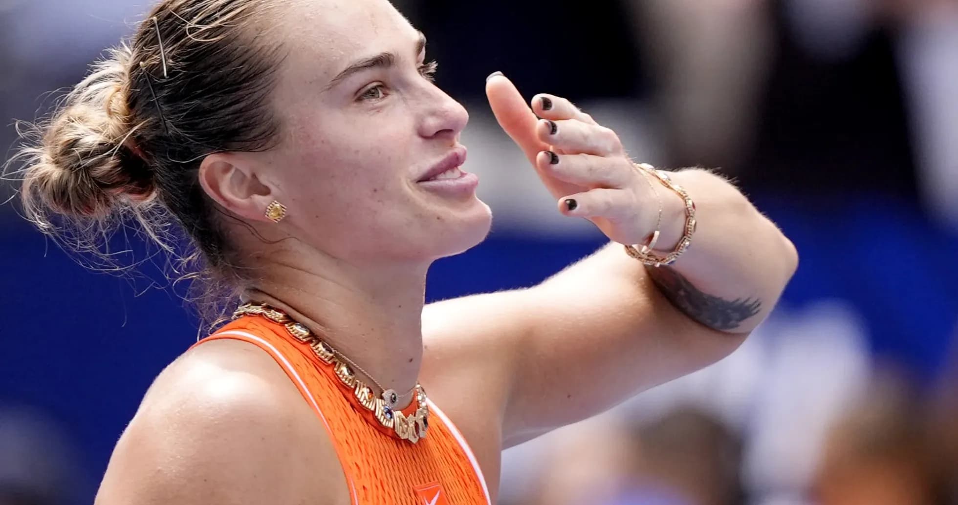 Tennis player celebrating after winning a match Tennis player celebrating after winning a match