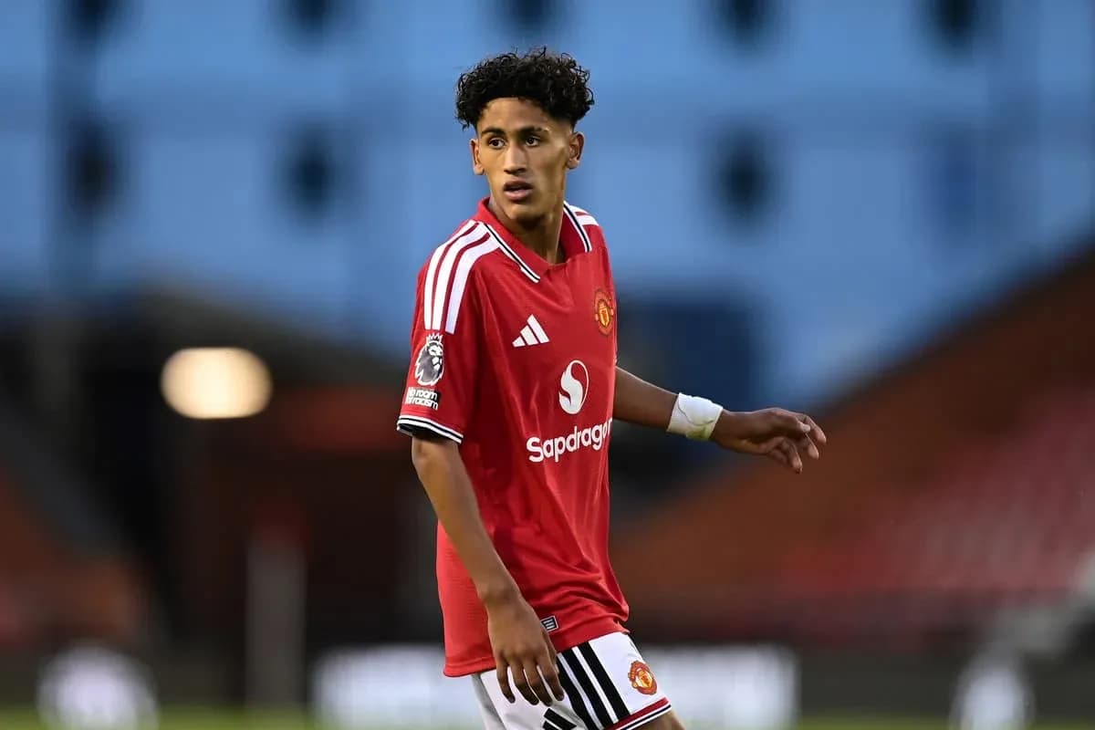 Player in Manchester United kit during match Player in Manchester United kit during match