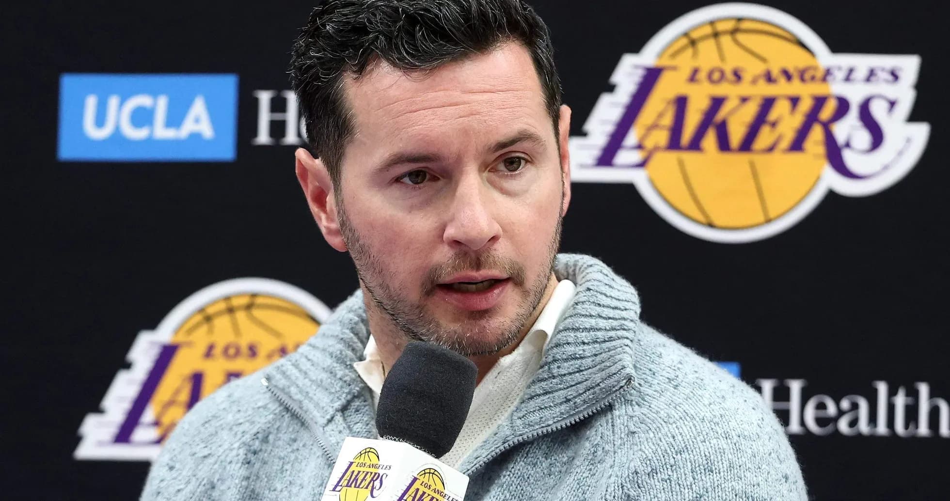 Man speaking at Los Angeles Lakers press conference Man speaking at Los Angeles Lakers press conference