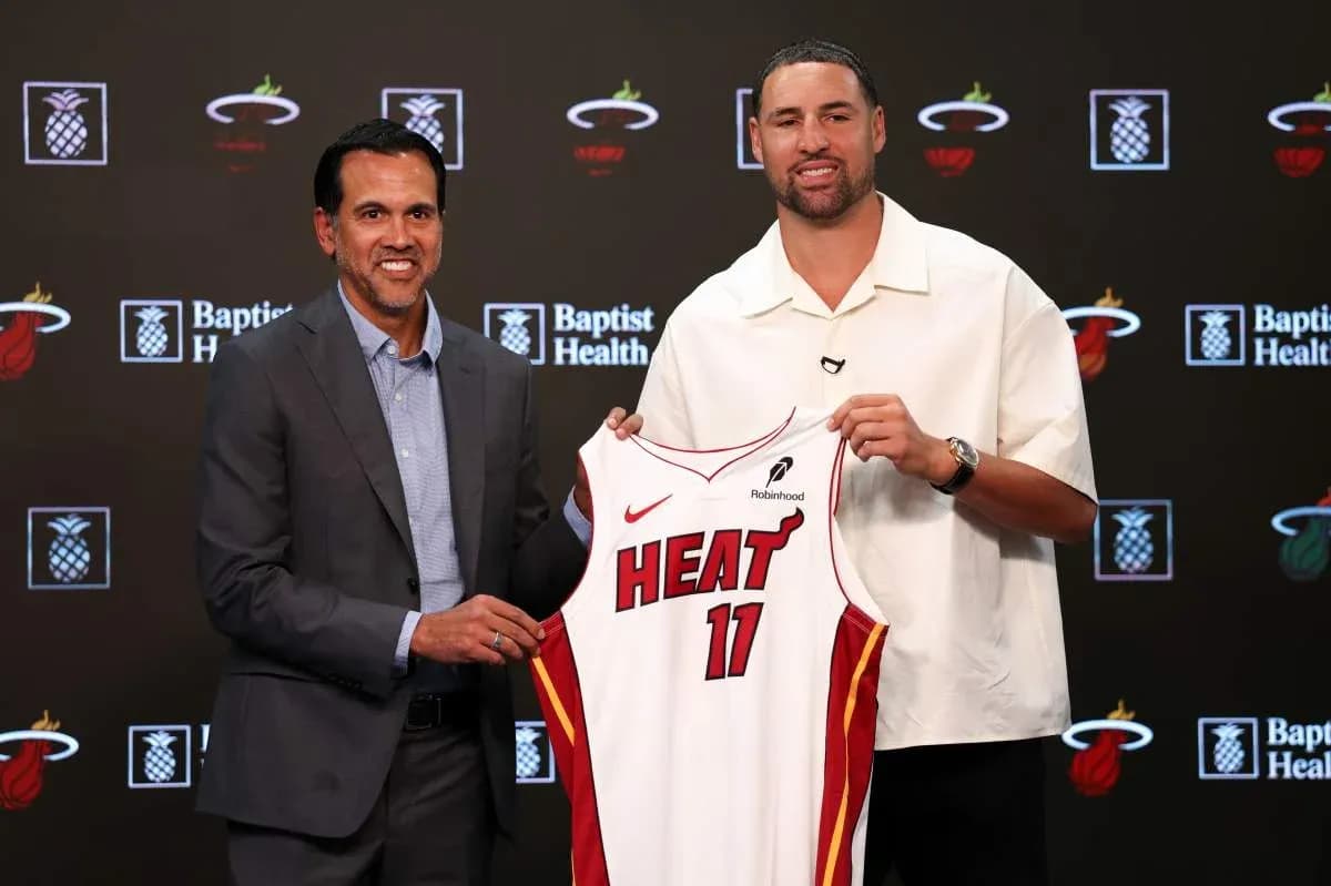 Coach and player unveiling Miami Heat jersey Coach and player unveiling Miami Heat jersey