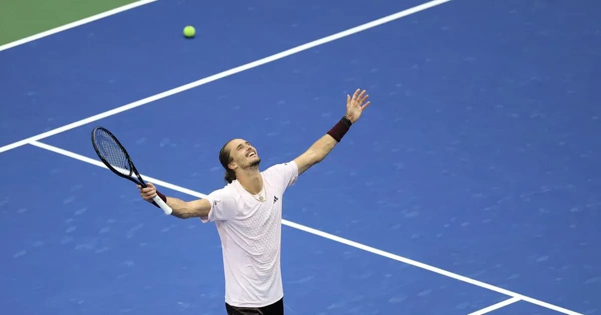 Tennis player celebrating after winning a point Tennis player celebrating after winning a point