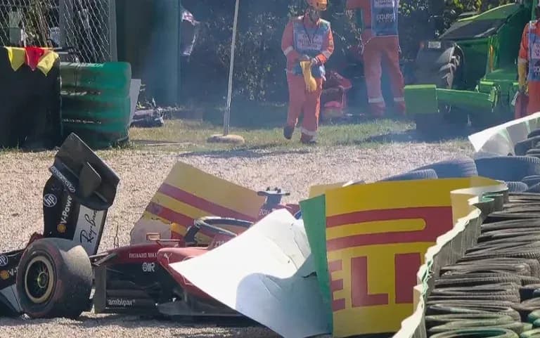 Damaged F1 car crashed into tire barriers Damaged F1 car crashed into tire barriers