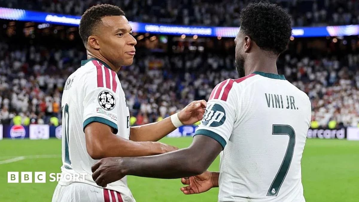 Mbappé and Vini Jr. celebrating during a match Mbappé and Vini Jr. celebrating during a match