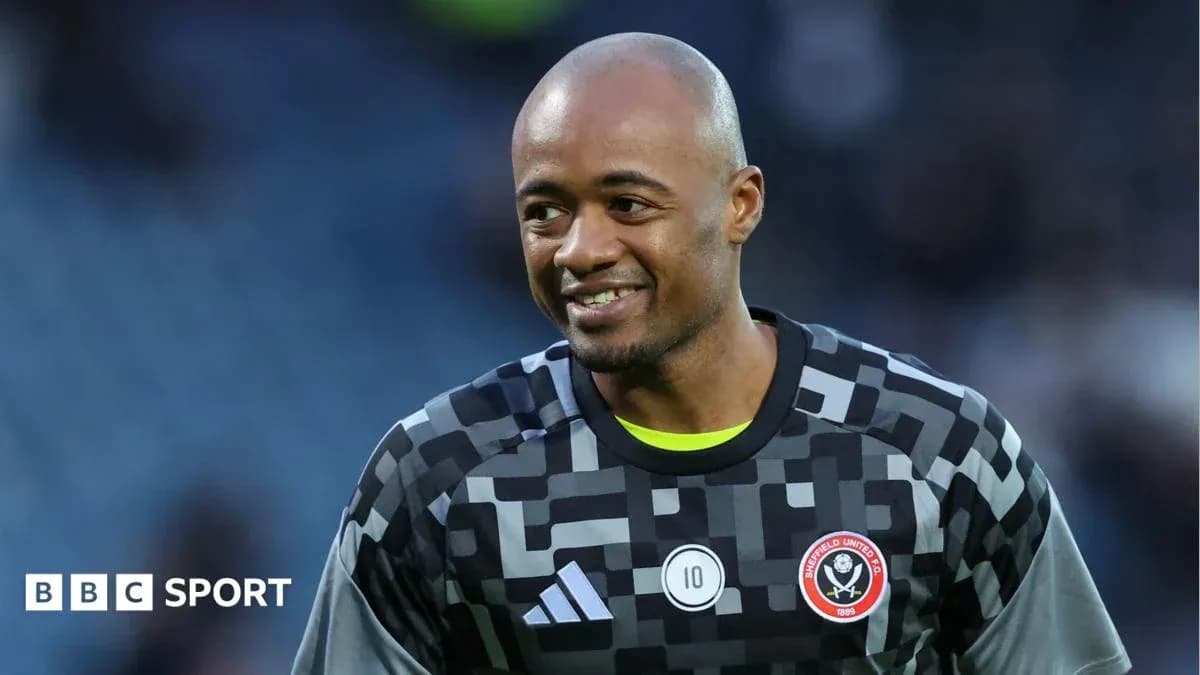 Goalkeeper smiling in Sheffield United kit before match Goalkeeper smiling in Sheffield United kit before match
