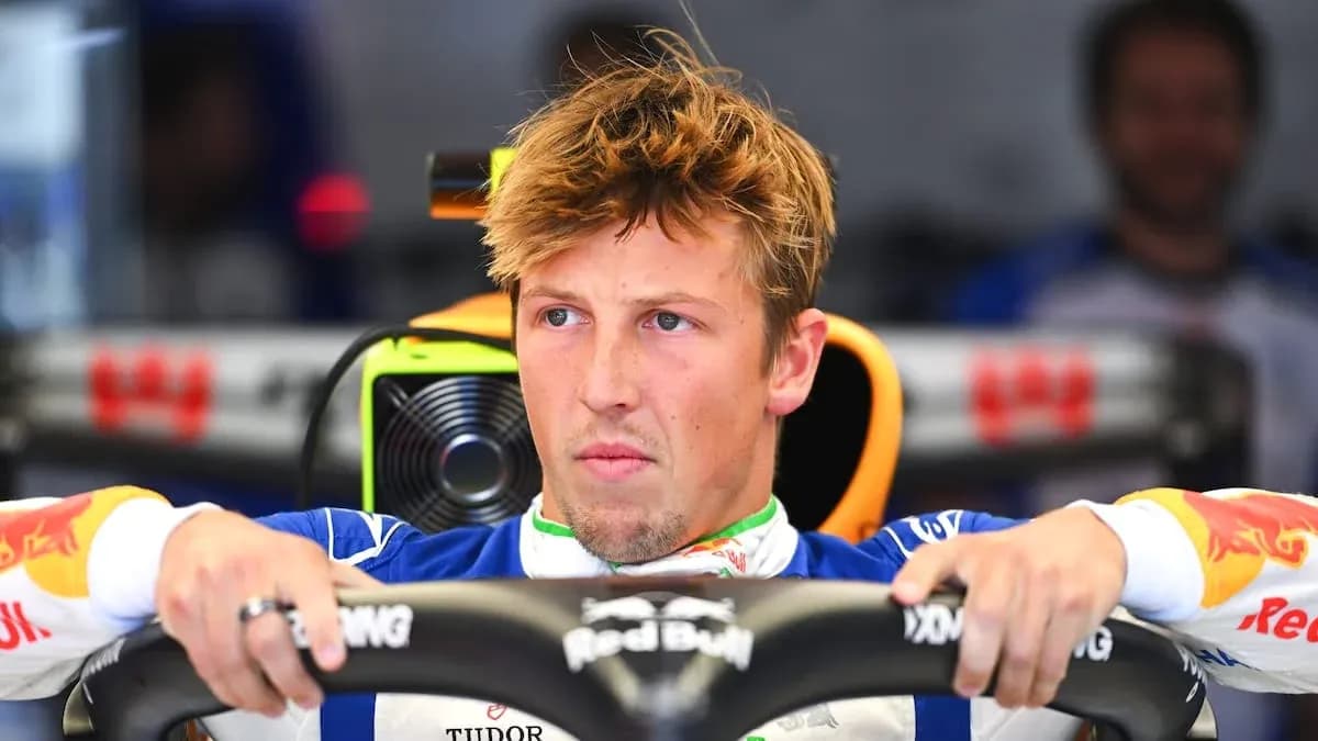 Driver focusing in cockpit of Formula 1 car Driver focusing in cockpit of Formula 1 car